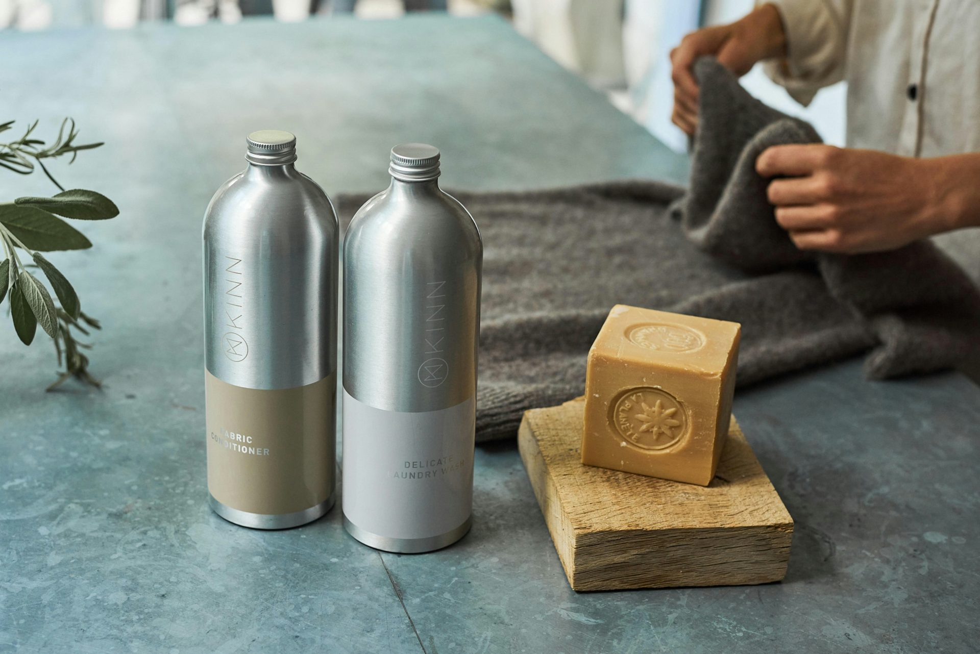 Bottles and soap block arranged on table